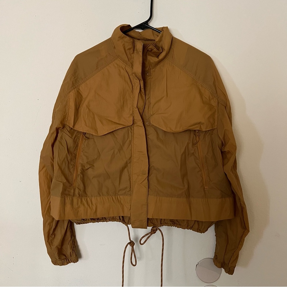 Athleta Cropped Drawstring Jacket in Mustard Brown